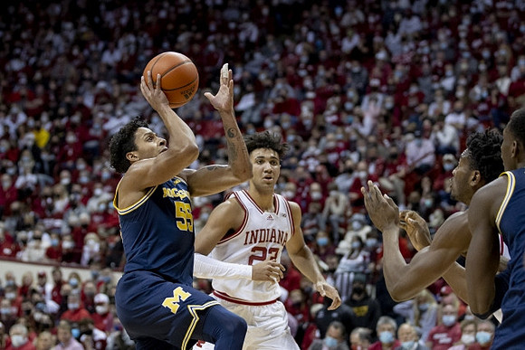 Eli Brooks (55) and Moussa Diabate (14)