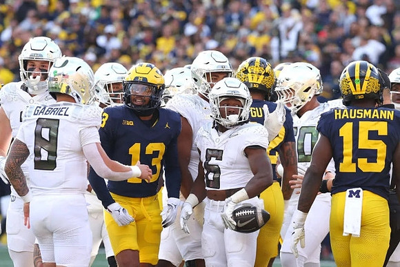 Wesley Walker (13), TJ Guy (42), and Ernest Hausmann (15)