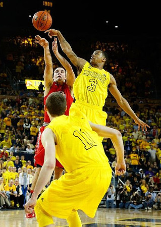 Nik Stauskas (11) and Trey Burke (3)