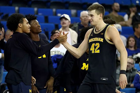 Phat Phat Brooks (8), L.J. Cason (2), and Will Tschetter (42)