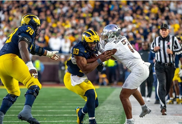 Myles Hinton (78) and Alex Orji (10)