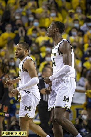 DeVante' Jones (12) and Moussa Diabate (14)