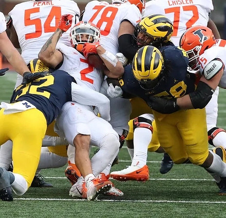 Jaylen Harrell (32) and Mazi Smith (58)
