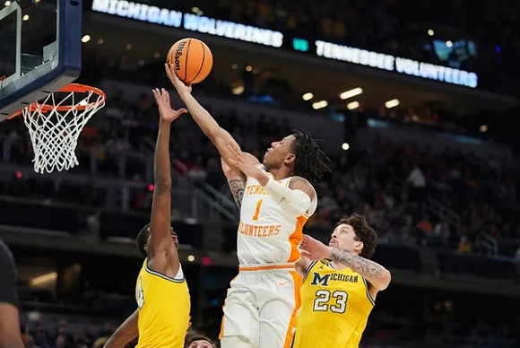 Moussa Diabate (14) and Brandon Johns Jr. (23)
