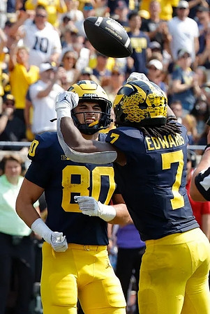 Hogan Hansen (80) and Donovan Edwards (7)