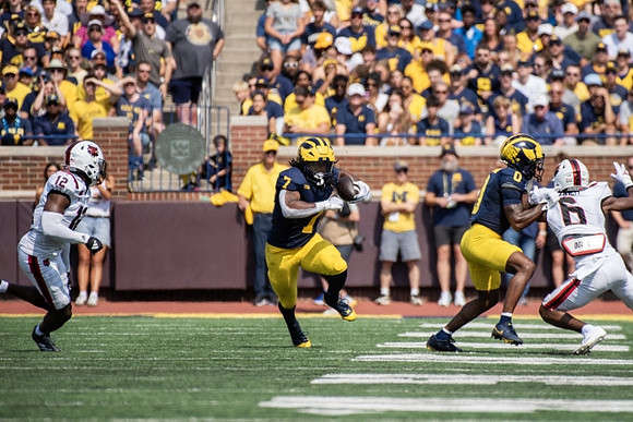 Donovan Edwards (7) and Semaj Morgan (0)