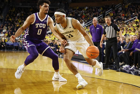 Roddy Gayle Jr. (11) and Texas Christian Head Coach Jamie Dixon