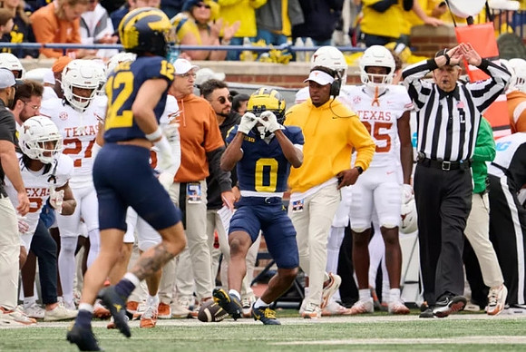 Kendrick Bell (12) and Semaj Morgan (0)