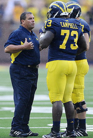 Brady Hoke, William Campbell (73), and Elliott Mealer (57)
