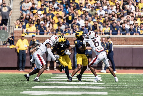 Donovan Edwards (7) and Semaj Morgan (0)