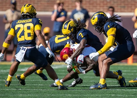 Quinten Johnson (28), Makari Paige (7), Jaishawn Barham (1), and Zeke Berry (10)