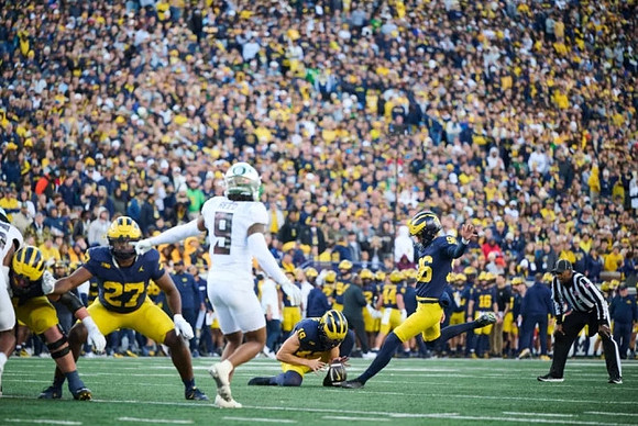 Tyler McLaurin (27), Tommy Doman (19), and Dominic Zvada (96)