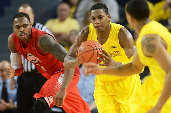 Glenn Robinson III (1) and Trey Burke (3)
