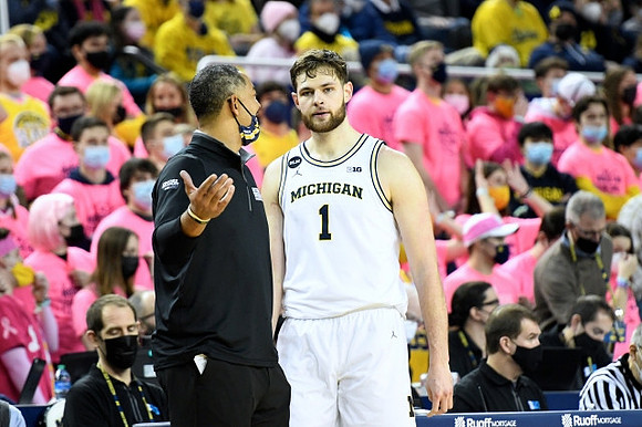 Juwan Howard and Hunter Dickinson (1)