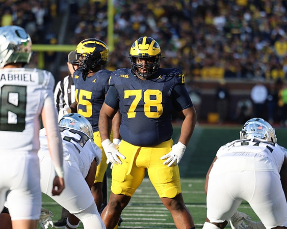 Mason Graham (55) and Kenneth Grant (78)