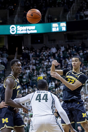 Moussa Diabate (14) and Caleb Houstan (22)