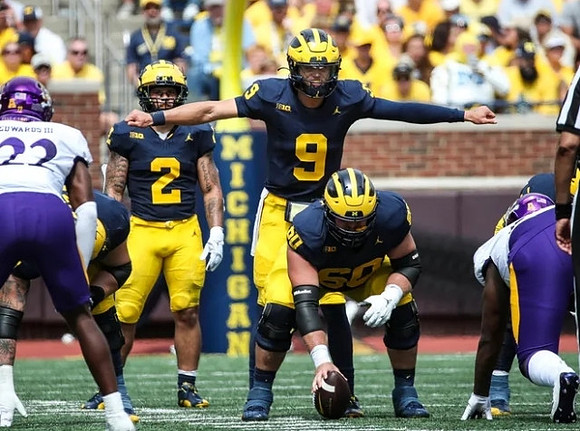 Blake Corum (2), J.J. McCarthy (9), and Drake Nugent (60)