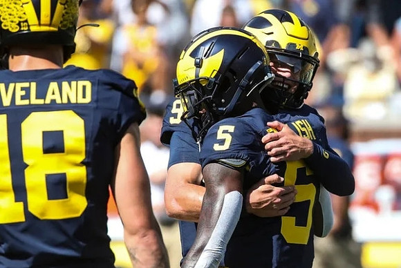 Colston Loveland (18), J.J. McCarthy (9), and Karmello English (5)