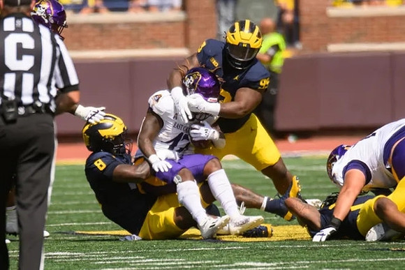 Derrick Moore (8) and Trey Pierce (95)