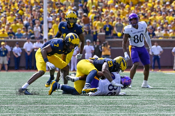 Josh Wallace (12), Makari Paige (7), and Michael Barrett (23)