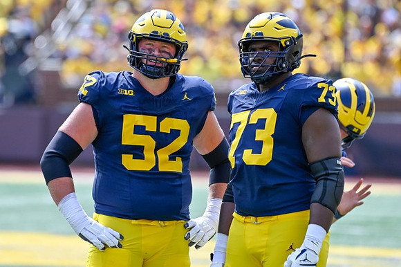 Karsen Barnhart (52) and LaDarius Henderson (73)