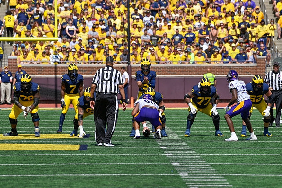 Benjamin Hall (28), Donovan Edwards (7), Zak Zinter (65), J.J. McCarthy (9), Trevor Keegan (77), and Trente Jones (53)