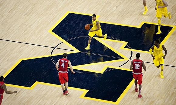Trey Burke (3), Tim Hardaway Jr. (10), and Nik Stauskas (11)