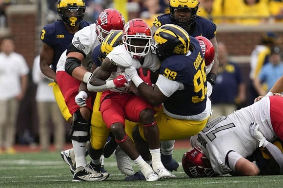Keon Sabb (3), Rayshaun Benny (26), and Cam Goode (99)