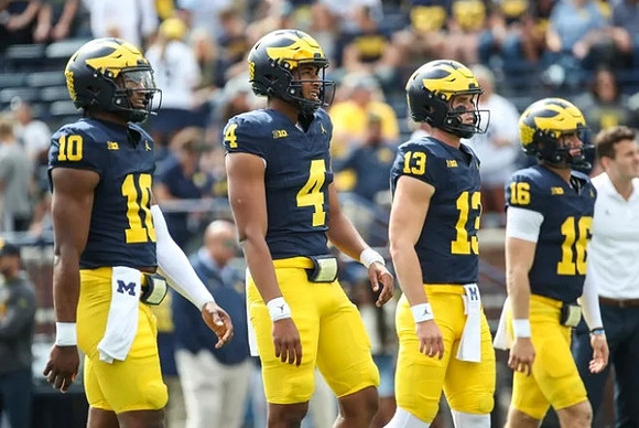 Alex Orji (10), Jayden Denegal (4), Jack Tuttle (13), and Davis Warren (16)