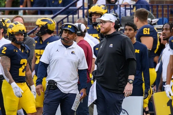Blake Corum (2), Mike Hart, and Jay Harbaugh