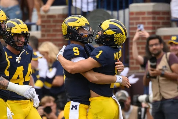 Max Bredeson (44), J.J. McCarthy (9), and Roman Wilson (1)