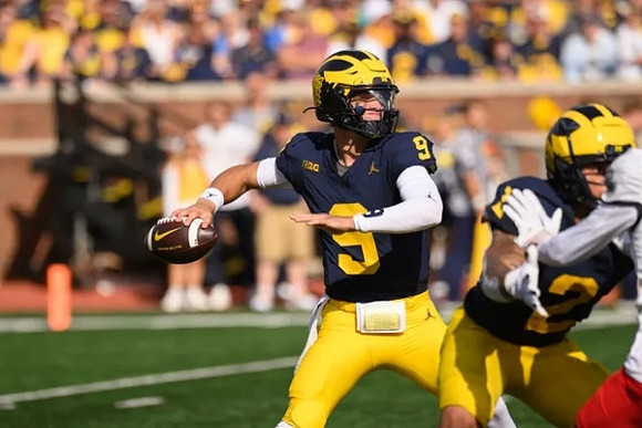 J.J. McCarthy (9) and Blake Corum (2)