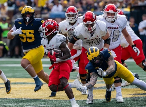 Mason Graham (55) and Braiden McGregor (17)