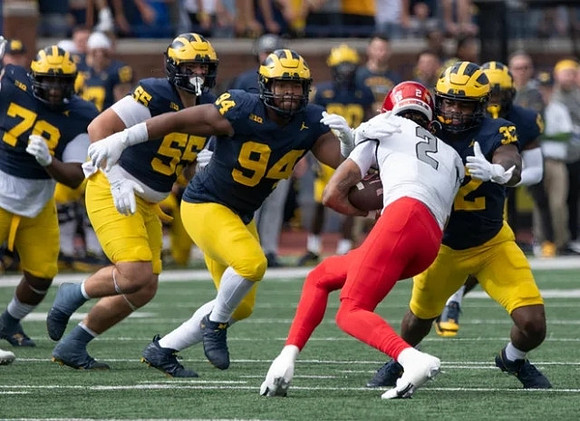 Kenneth Grant (78), Mason Graham (55), Kris Jenkins (94), and Jaylen Harrell (32)