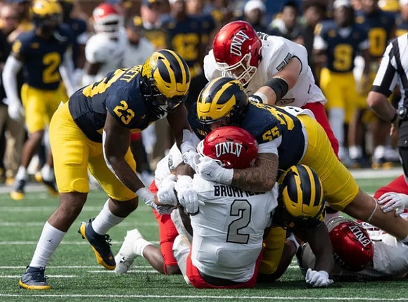 Michael Barrett (23) and Mason Graham (55)