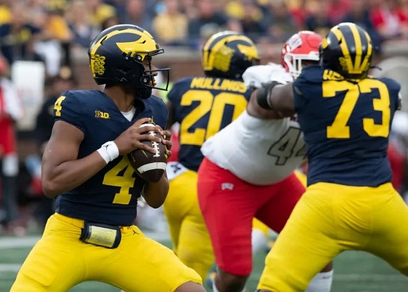Jayden Denegal (4), Blake Corum (2), and LaDarius Henderson (73)