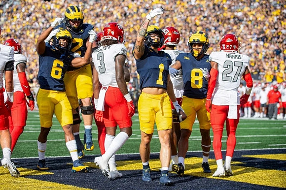 Karsen Barnhart (52), Cornelius Johnson (6), Roman Wilson (1), and J.J. McCarthy (9)