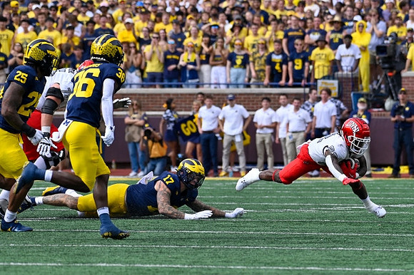 Junior Colson (25), Keshaun Harris (36), and Braiden McGregor (17)