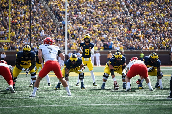 Myles Hinton (78), Zak Zinter (65), J.J. McCarthy (9), Drake Nugent (60), and Trevor Keegan (77)