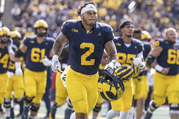 Blake Corum (2) and Michigan Team