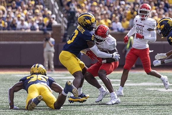 Keshaun Harris (36), Mike Sainristil (0), and Keon Sabb (3)
