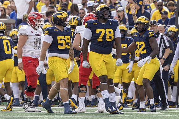 Mike Sainristil (0), Mason Graham (55), Kenneth Grant (78), and Jaylen Harrell (32)