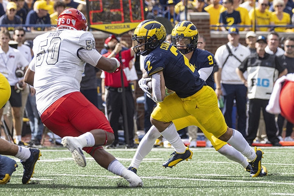 Blake Corum (2) and J.J. McCarthy (9)