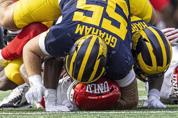 Mason Graham (55) and Jaylen Harrell (32)