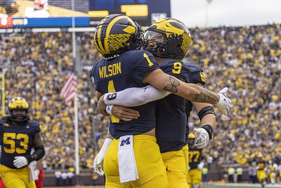Trente Jones (53), Roman Wilson (1), and J.J. McCarthy (9)
