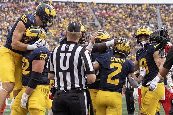 AJ Barner (89), Karsen Barnhart (52), Blake Corum (2), and Colston Loveland (18)