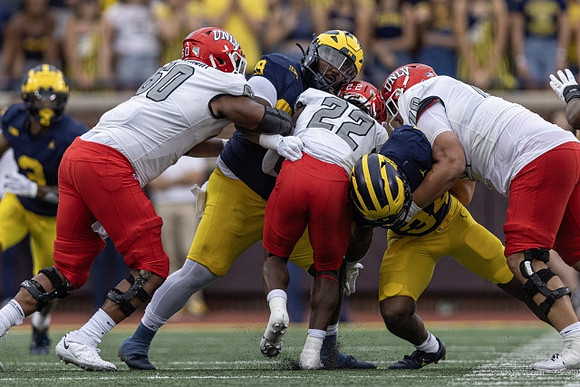 Keon Sabb (3), Cam Goode (99), and Jaydon Hood (34)