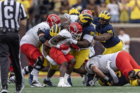 Cam Goode (99) and Rayshaun Benny (26)