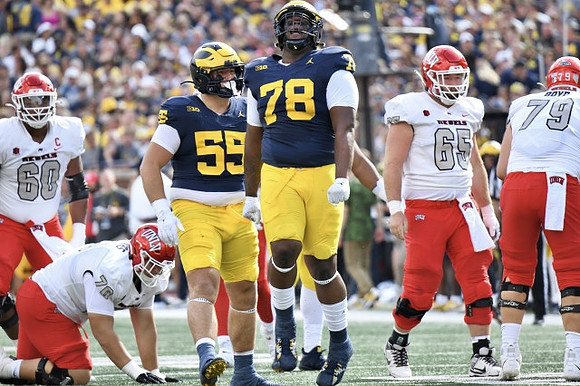Mason Graham (55) and Kenneth Grant (78)