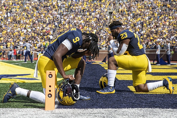 Rod Moore (9) and Michael Barrett (23)